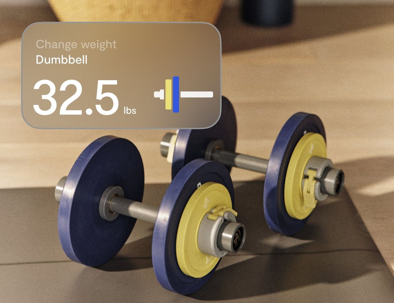 Two Tempo dumbbells loaded with blue and yellow plates, beside an on-screen card that reads: Change weight, Dumbbell, 32.5 lb.